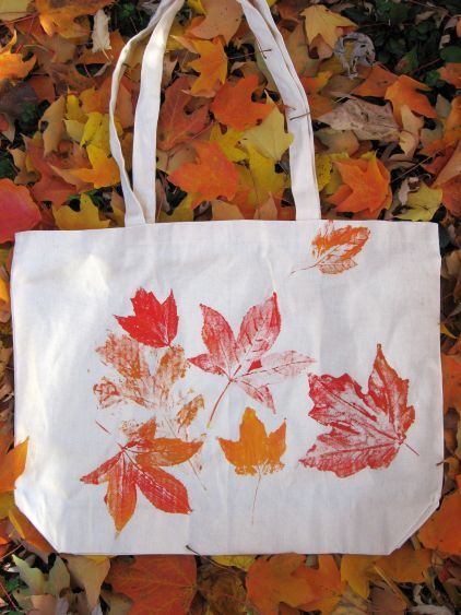 An example of a decorated canvas bag with leaf prints.