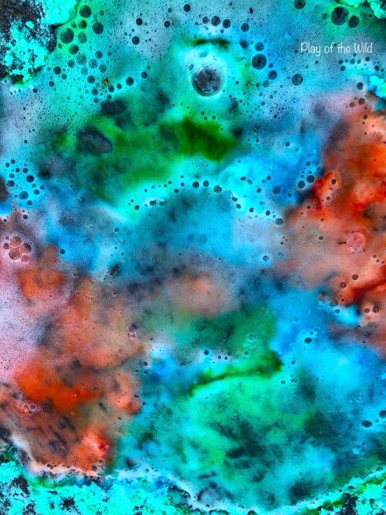 colorful fizzing of baking soda and vinegar