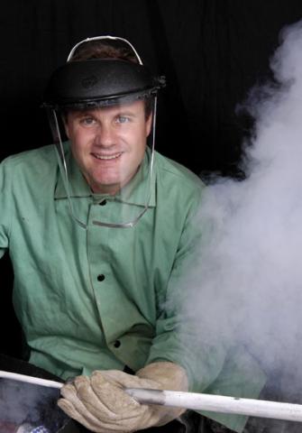 Man in green shirt with liquid nitrogen