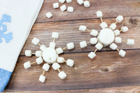 Snowflake shapes made with marshmallows and toothpicks