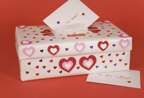 White box with red and pink hearts
